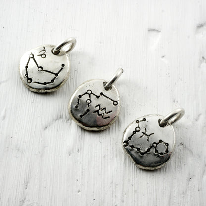 Pendentif constellation du zodiaque en argent